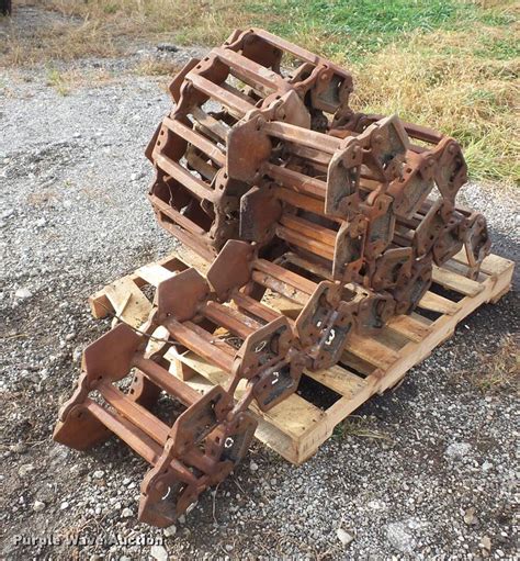 skid steer steel grouser tracks|grouser track bolts and bushings.